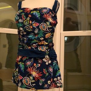 Swim dress lined and padded. Metal accents